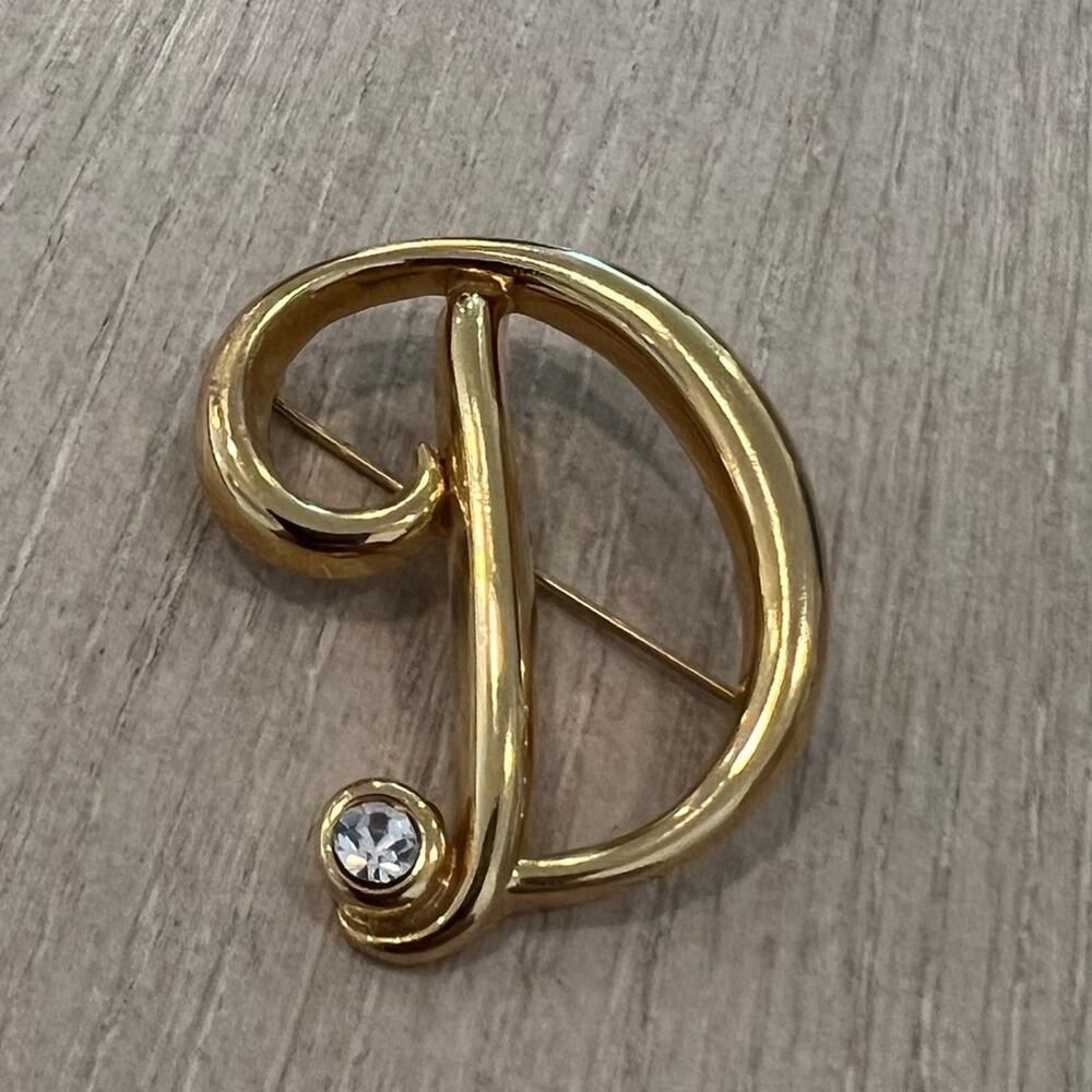 Vintage Monet D letter rhinestone brooch